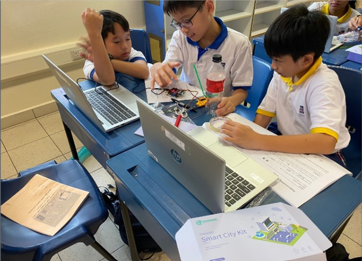 Students using the SMART City Kit in a classroom